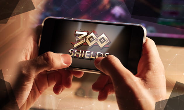 Ein Smartphone auf dem der Spielautomate 300 Shields abgebildet ist.