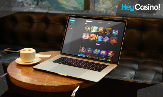 Einige Spiele des HeyCasino! im Überblick auf einem Laptop-Bildschirm.