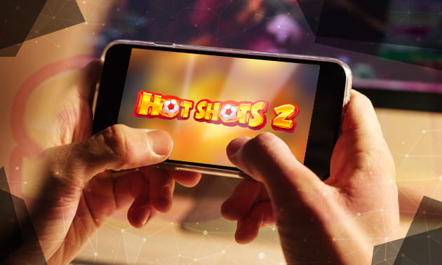 Der Slot Hot Shots 2 auf einem Smartphone.